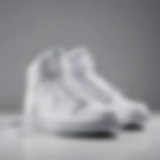 Stylish all white Nike high tops elegantly displayed on a minimalist background.