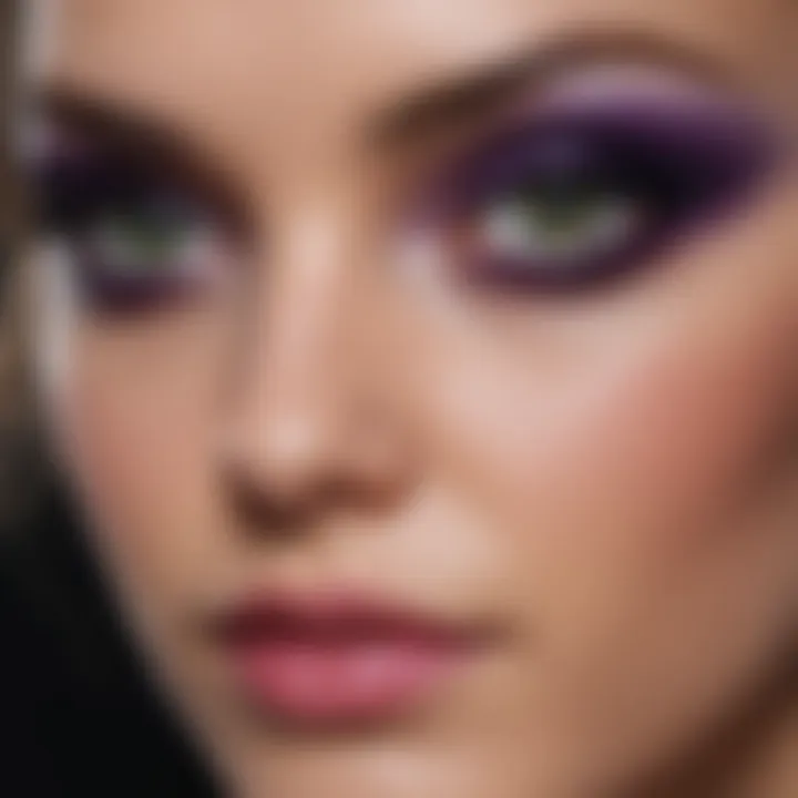 A close-up view of deep purple eyeshadow blending on green eyes