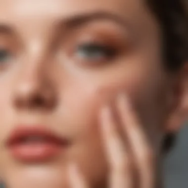 Application Techniques for Tinted Mineral Sunscreen Close-up of a hand applying tinted mineral sunscreen on the face