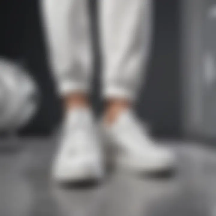 White sneakers paired with trendy clothing