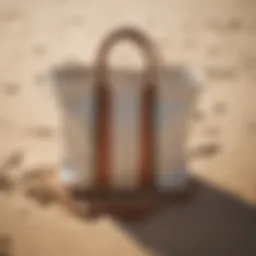 Stylish canvas beach bag resting on the sand