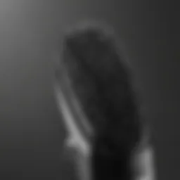 Close-up view of the Conair straightening brush showcasing its bristles and heating elements.