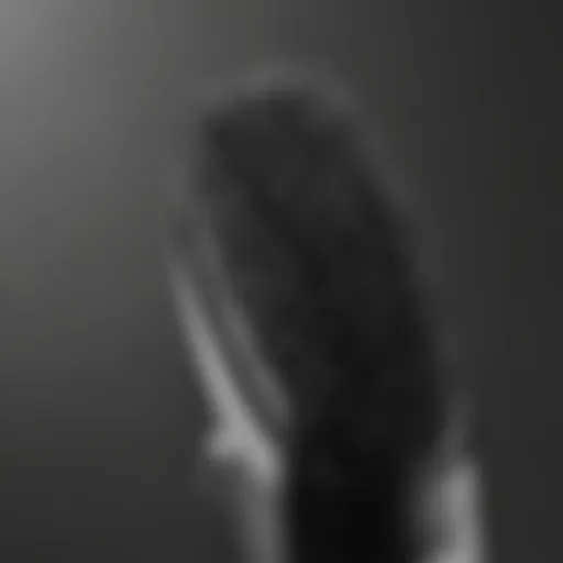 Close-up view of the Conair straightening brush showcasing its bristles and heating elements.