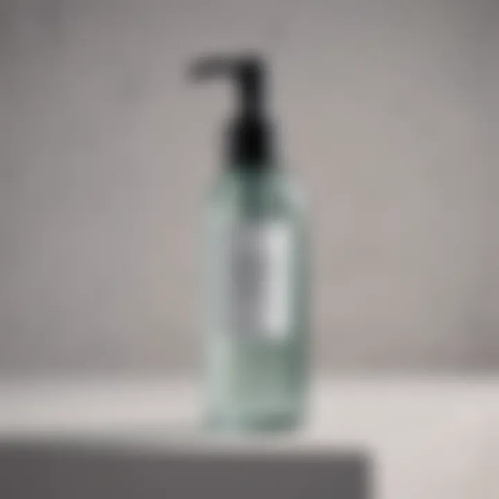 A sleek bottle of gel cleanser with a pump dispenser against a minimalist backdrop.