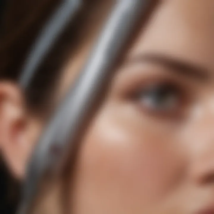 Close-up of an electric current facial wand demonstrating its sleek design and technology.