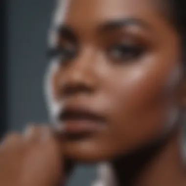 A makeup artist applying products on black skin to showcase flawless results