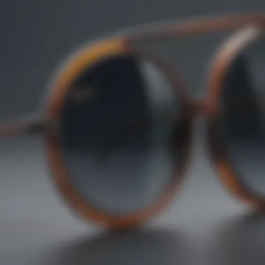 Close-up of designer logo on round frame sunglasses