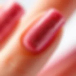 Close-up view of sparkling rose gold glitter nail polish