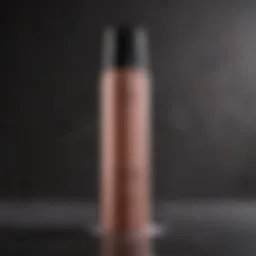 A luxurious bottle of volumizing dry shampoo against a textured background