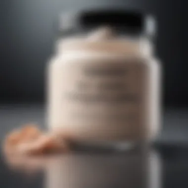 Close-up view of a luxurious butt cream jar with active ingredients displayed.