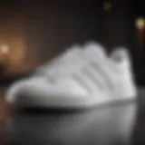 Elegant display of Adidas white shoes showcasing their sleek design.