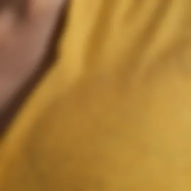 Textural Elegance Close-up of the fabric texture of the Madewell yellow top