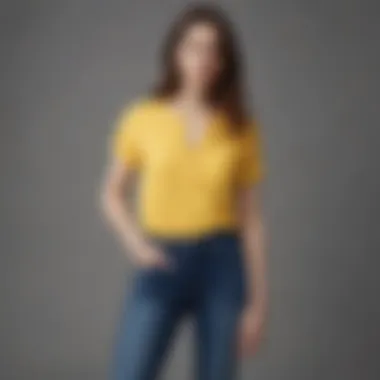 Stylish display of the Madewell yellow top paired with denim