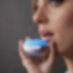 A close-up view of a Foreo blue light therapy device highlighting its sleek design and technology.
