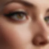 Close-up of a woman's eye with precisely applied eyeliner on the top lid