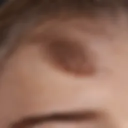 Close-up view of dry patches on a scalp