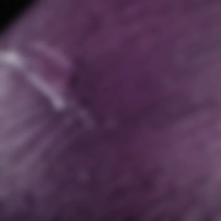 Close-up of purple shampoo texture in a palm